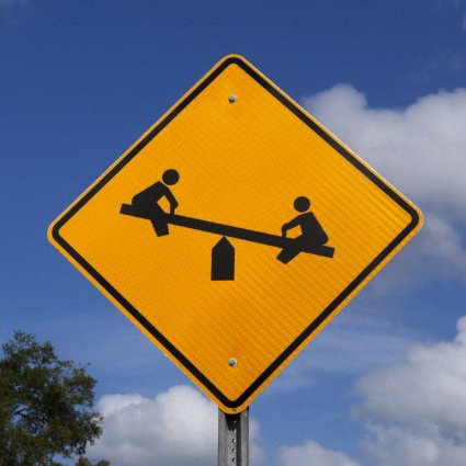 Florida, USA --- Traffic warning sign for children's playground. --- Image by © 68/Pat Canova/Ocean/Corbis